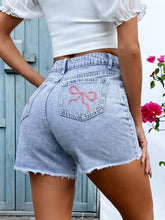 Load image into Gallery viewer, Bow embroidered denim shorts

